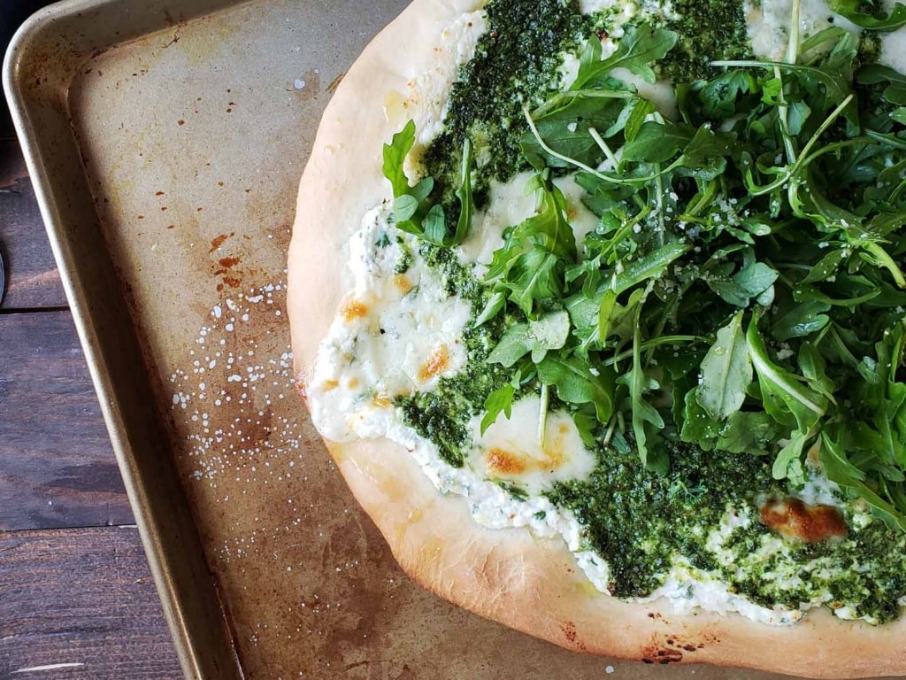 Pizza pesto à la roquette et ricotta Cinq Fourchettes